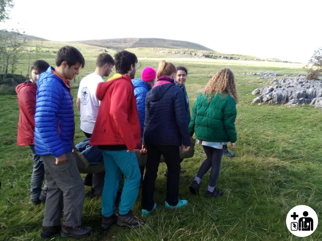 Casualty evacuation outdoors DofE participants being trained.