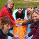 Blended First Aid Courses, ladies supporting a casualty on the ground
